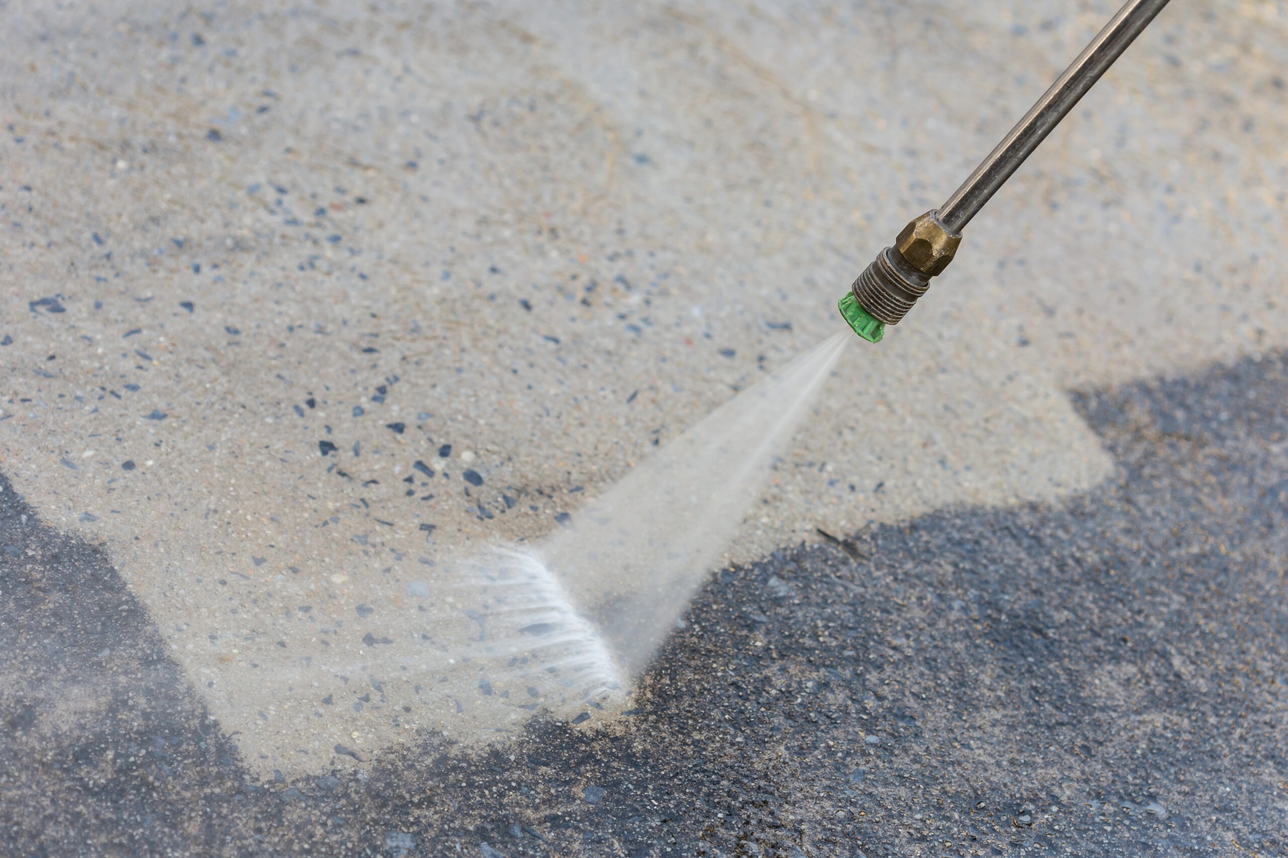 Close up Outdoor floor cleaning with high pressure water jet